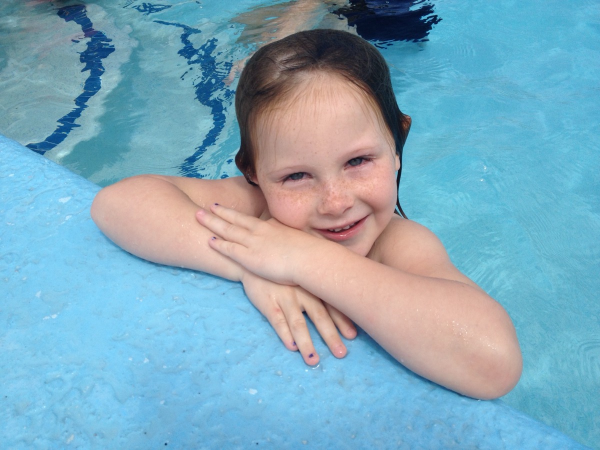 Young gymnast training during summer camp at Bare Foot Gym